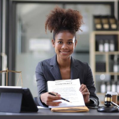 Lawyer or legal advisor working on the desk in the law firm ready to give you advice.